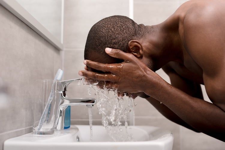 Man washing face