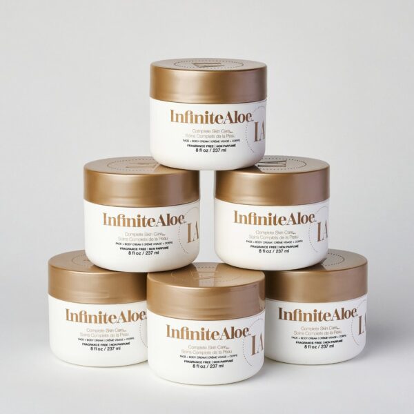 Six jars of IA Skin Care Six-Pack - Fragrance Free, each white with gold lids and labeled 8 fl oz / 237 ml, are stacked in a pyramid on a plain white background.