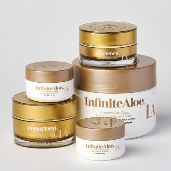 Five jars from the Ultimate Beauty Collection - Gold + Fragrance Free, labeled “réparneu” and “InfiniteAloe,” with gold and white packaging, are displayed on a light background.