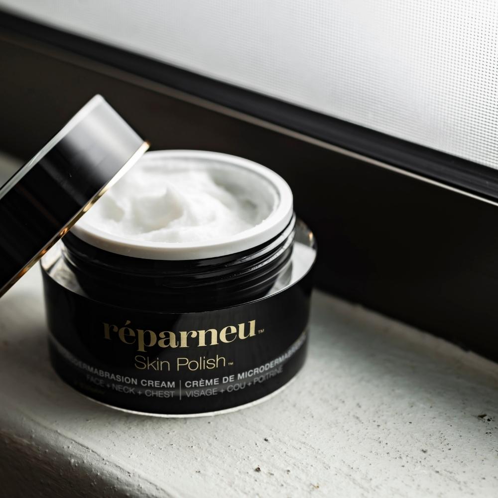 Opened jar of réparneu Skin Polish Microdermabrasion Cream