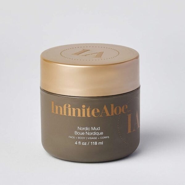 A closeup image shows Nordic Mud by InfiniteAloe, a 4 fl oz (118 ml) face and body jar with a gold lid, taupe container, and product info in white and gold text on the label.